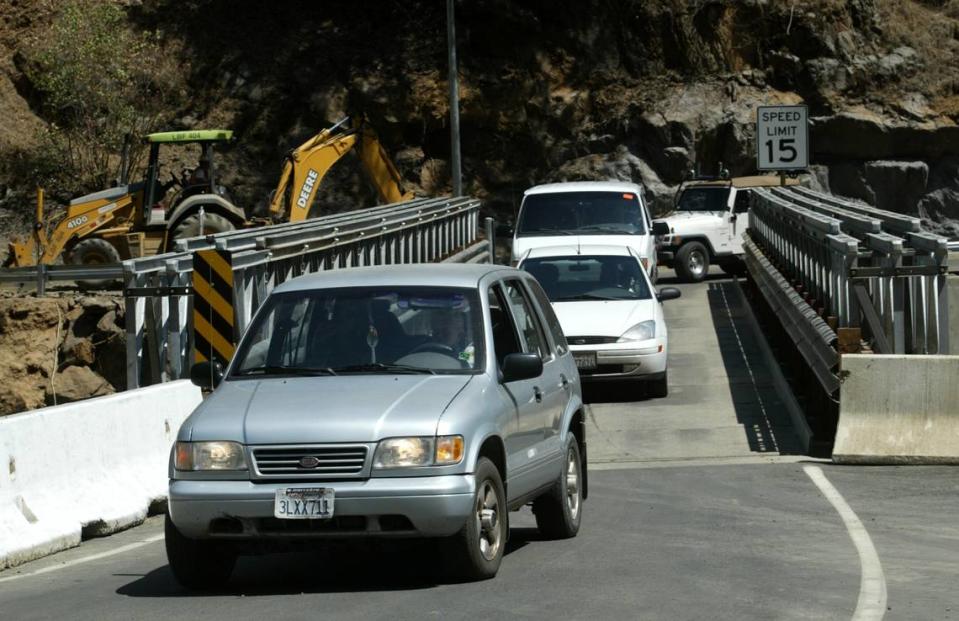 Cars cross a one-lane bridge near Yosemite National Park in 2006 that was constructed after the massive Ferguson rock slide buried part of Highway 140 leading to Yosemite.