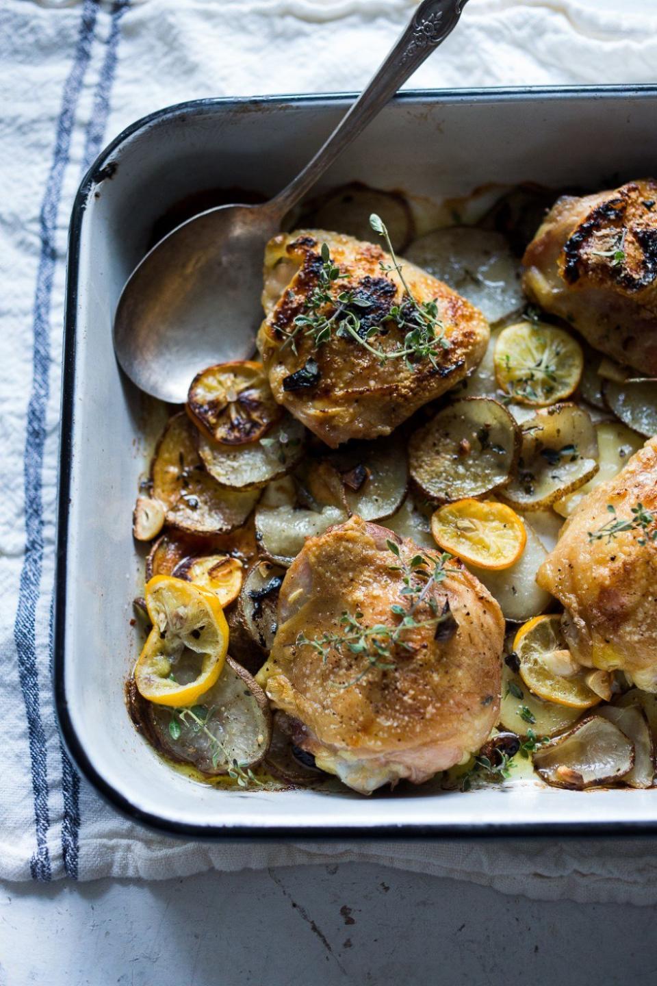 <strong>Get the <a href="https://www.feastingathome.com/one-pan-chicken-and-crispy-potatoes/" target="_blank">Sheet-Pan Chicken And Crispy Potatoes With Lemon And Thyme</a> recipe from Feasting At Home</strong>