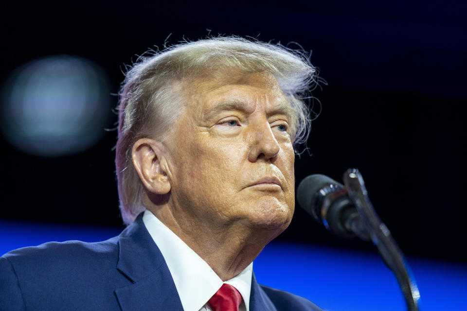 FILE - Former President Donald Trump speaks at the Conservative Political Action Conference, CPAC 2023, Saturday, March 4, 2023, at National Harbor in Oxon Hill, Md. Trump has been ordered to pay a six-figure legal bill to a company founded by a former British spy that he unsuccessfully sued for making what his lawyer called “shocking and scandalous" false claims that harmed his reputation, it was reported on Thursday, March 7, 2024. (AP Photo/Alex Brandon, File)