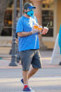 <p>Adam Sandler picks up snacks for his family during a Saturday outing with his wife Jackie in Malibu, California.</p>