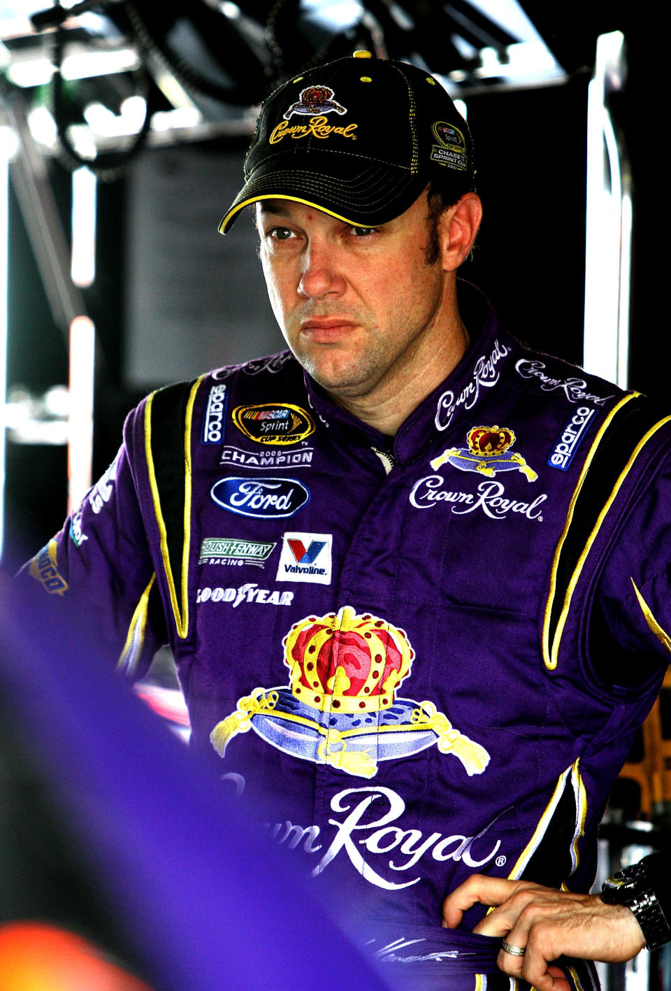 HOMESTEAD, FL - NOVEMBER 19: Matt Kenseth, driver of the #17 Crown Royal Ford, stands in the garage area during practice for the NASCAR Sprint Cup Series Ford 400 at Homestead-Miami Speedway on November 19, 2011 in Homestead, Florida. (Photo by Jerry Markland/Getty Images for NASCAR)