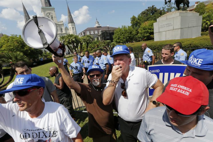 Former Ku Klux Klan leader David Duke, surrounded by a group of supporters, speaks in defense of a statue of Confederate Army General Andrew Jackson in New Orleans Saturday, Sept. 24, 2016. Duke, who lost his own campaign for the U.S. Tuesday, has been a vocal supporter of Donald Trump’s bid for the White House. (Photo: Gerald Herbert/AP)