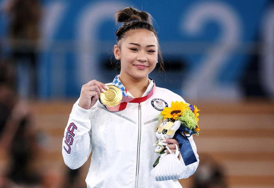 Image: Sunisa Lee of Team United States poses with her gold medal after winning the Women's All-Around Final on day six of the Tokyo Olympic Games at Ariake Gymnastics Centre on July 29, 2021. (Jamie Squire / Getty Images)