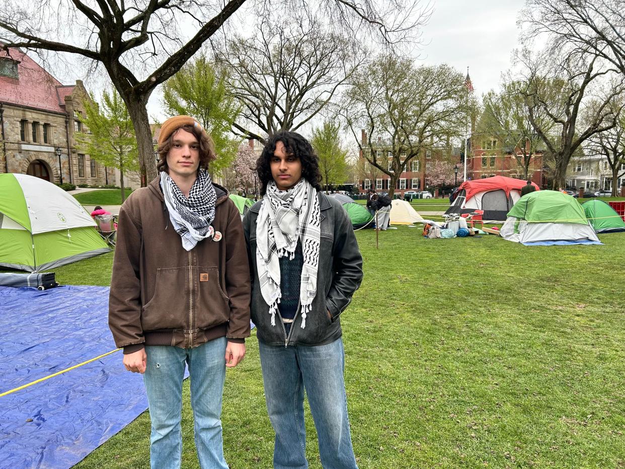 From left to right: Rafi Ash, a sophomore, and Arman Deendar, a junior, stand in the Brown University encampment.