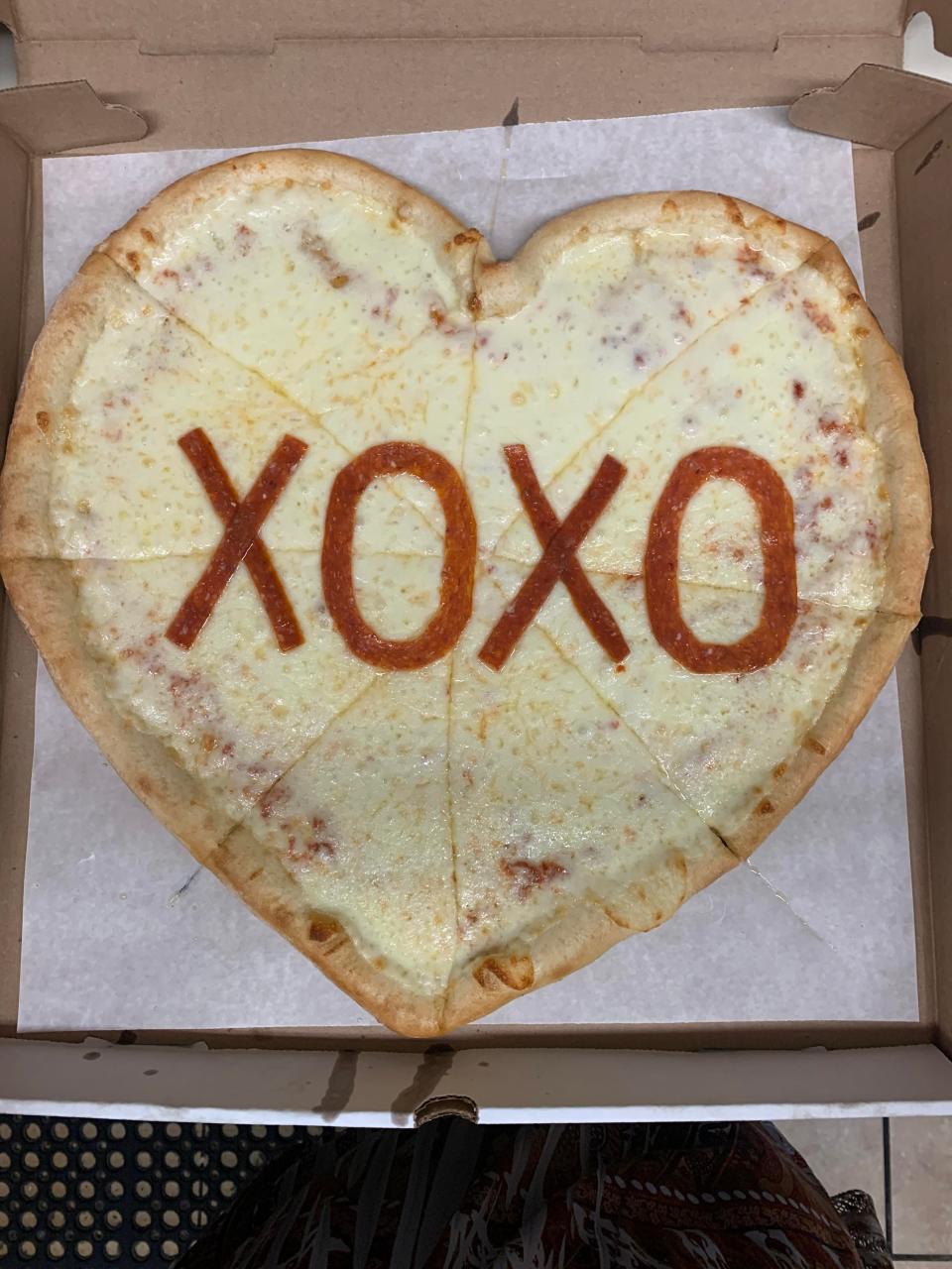 Heart shaped message pizzas from Paradise Pizza.