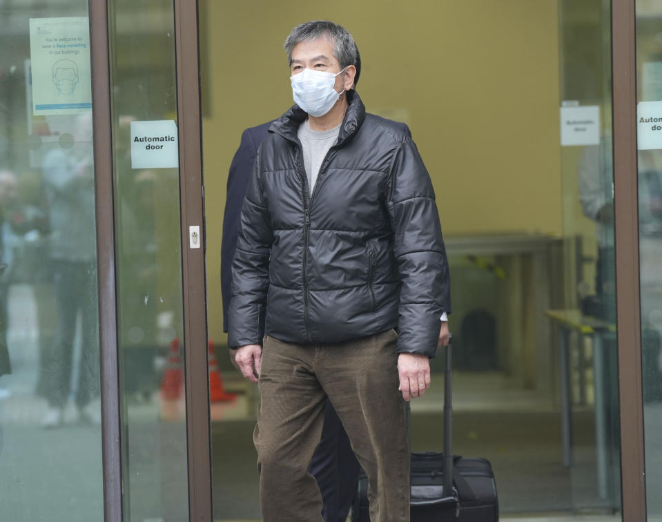 Chung Biu Yuen leaves Westminster Magistrates' Court in central London, Monday May 13, 2024. Three men have appeared in a London court on charges that they helped the Hong Kong intelligence service gather information in Britain amid growing concern that hostile states are trying to interfere with democracy and economic activity in the U.K. Chi Leung (Peter) Wai, Matthew Trickett, and Chung Biu Yuen, were granted bail during a brief hearing at Westminster Magistrates’ Court on Monday. (Yui Mok/PA via AP)