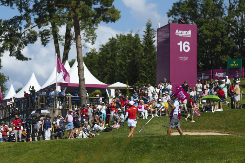 Minjee Lee, of Australia waves to the public during the last round of the Evian Championship women's golf tournament in Evian, eastern France, Sunday, July 25, 2021. (AP Photo)