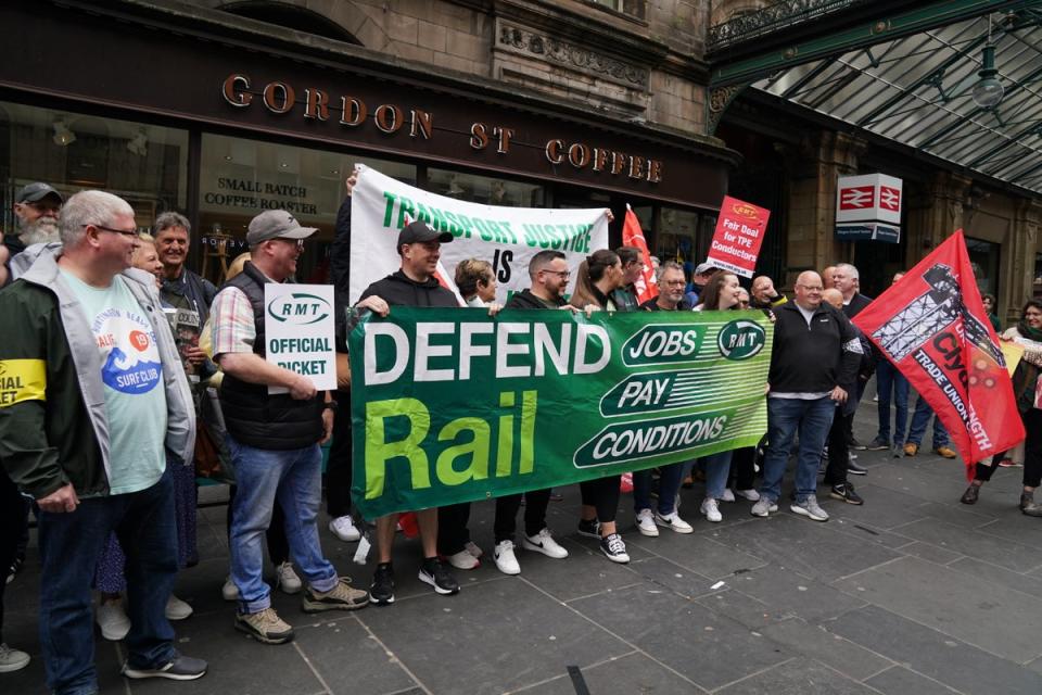 The picket line outside Glasgow Central Station (Andrew Milligan/PA) (PA Wire)