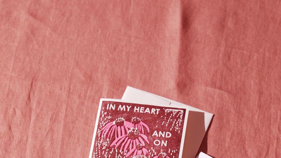 sympathy cards on pink fabric sheet