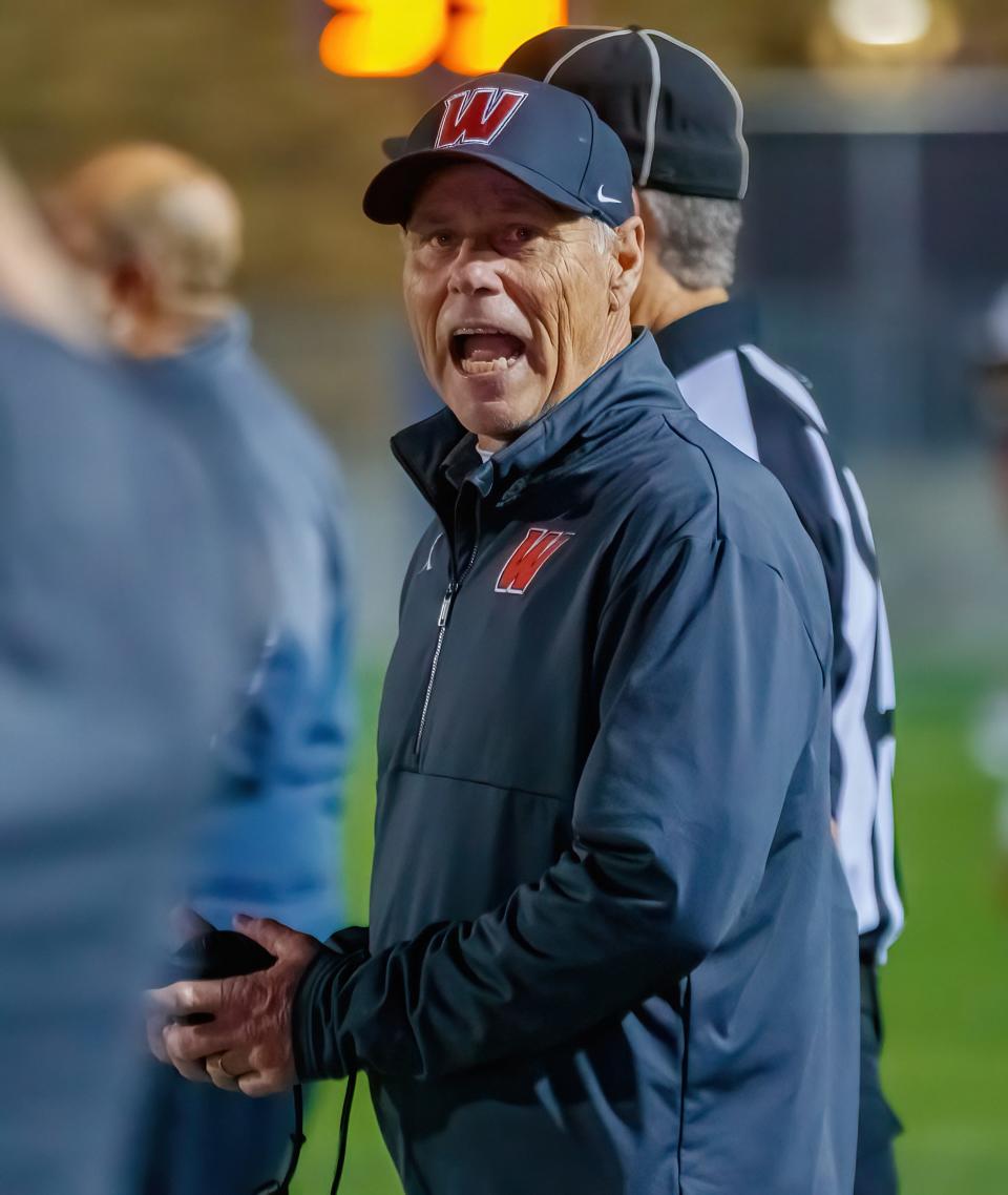 Weiss head coach Steve Van Meter shouts instructions to an assistant coach during his team's playoff win over San Antonio Veterans Memorial last season. With 198 career wins, Van Meter enters the season as the Austin area's leader in coaching wins among current coaches.