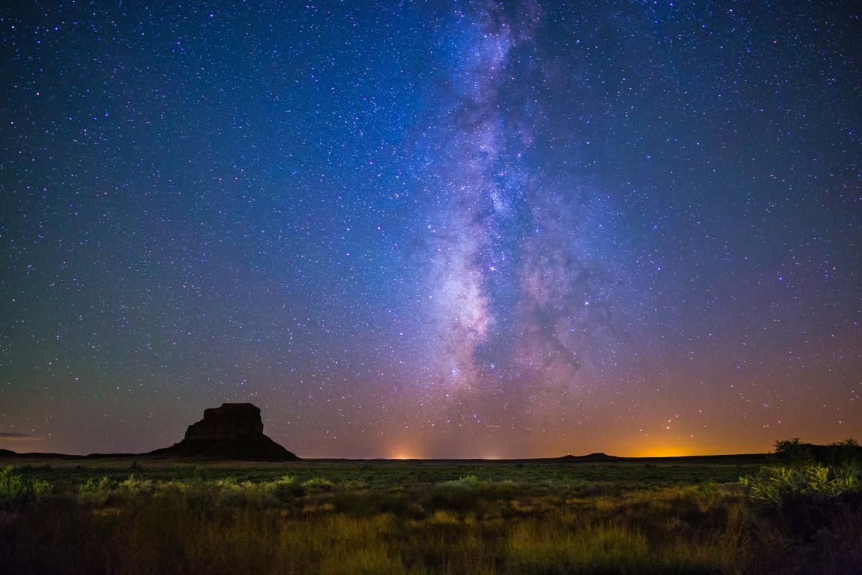 The Milky Way illuminates the sky above Fajada Butte at Chaco Culture National Historical Park in New Mexico.