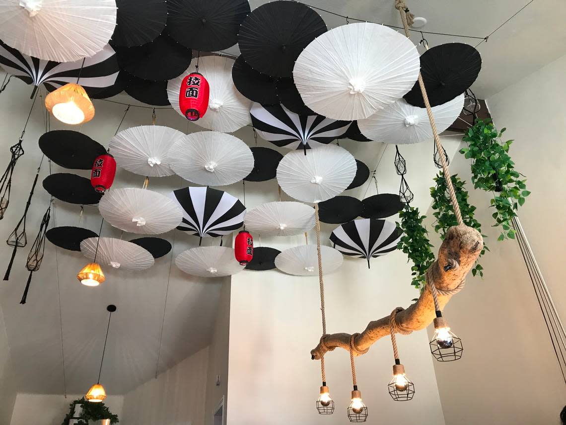 Oriental lanterns and a driftwood chandelier are part of the exotic decor in the new indoor-seating section at Chowa Bowl, an Asian fusion restaurant in Morro Bay.
