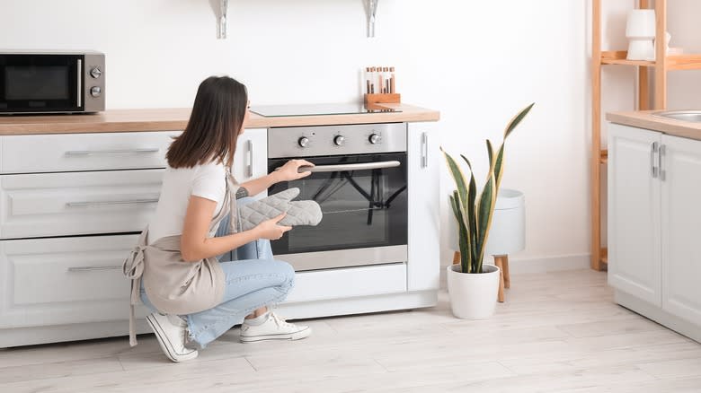 Person watching oven