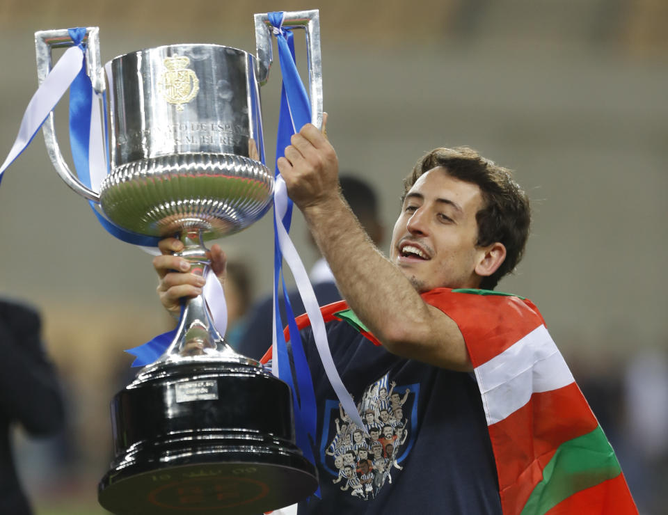 Real Sociedad's Mikel Oyarzabal, who scored the only goal, celebrates winning the final of the 2020 Copa del Rey, or King's Cup, soccer match between Athletic Bilbao and Real Sociedad at Estadio de La Cartuja in Sevilla, Spain, Saturday April 3, 2021. The game is the rescheduled final of the 2019-2020 competition which was originally postponed due to the coronavirus pandemic. (AP Photo/Angel Fernandez)