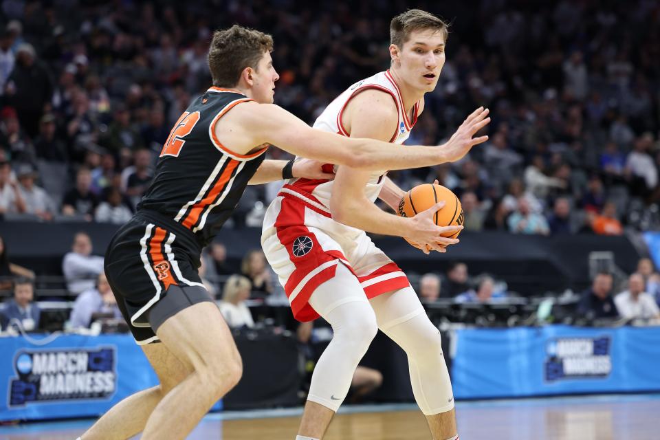 Mar 16, 2023; Sacramento, CA, USA; Arizona Wildcats forward Azuolas Tubelis (10) controls the ball against Princeton Tigers forward Caden Pierce (12) during the first half at Golden 1 Center. Mandatory Credit: Kelley L Cox-USA TODAY Sports