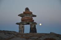 RANKIN INLET - NUNAVUT - AUGUST 20: Moon over Inukshuk in Rankin Inlet, NU. For Tonda MacCharles feature on Inuit languages. T (Tonda MacCharles/Toronto Star via Getty Images)