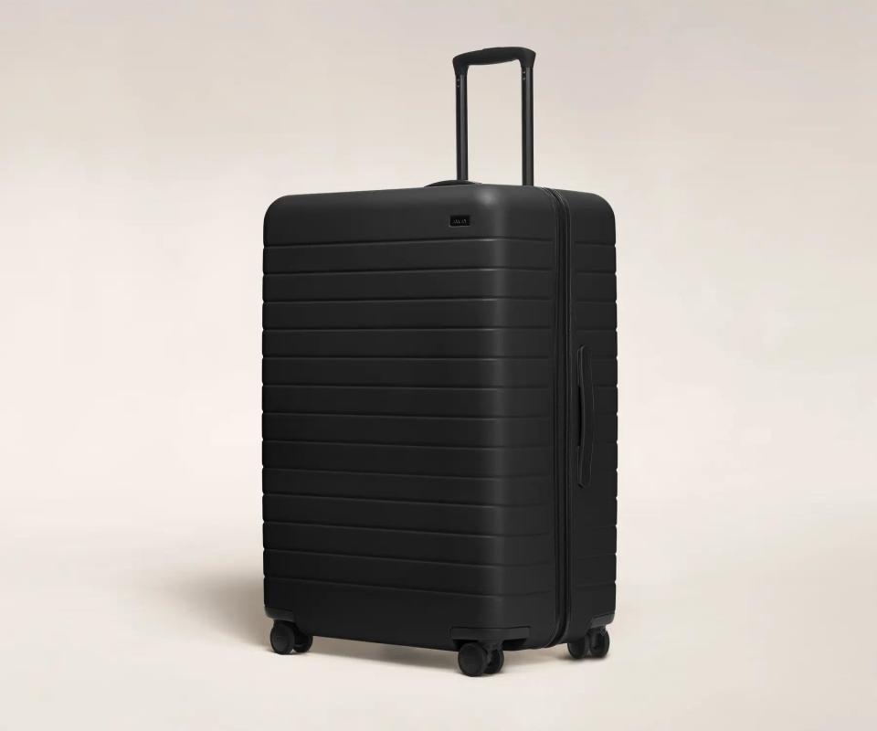 <p><a href="https://go.redirectingat.com?id=74968X1596630&url=https%3A%2F%2Fwww.awaytravel.com%2Fsuitcases%2Flarge%3Fcolor%3Dblack%26gclid%3DCjwKCAjwg-GjBhBnEiwAMUvNW7YPwsAYl-804vDZtdjrrWyVoU7WCDgUeaMDoNd6B8ibXeH50Gi86BoCzG0QAvD_BwE&sref=https%3A%2F%2Fwww.esquire.com%2Flifestyle%2Fcars%2Fg44070315%2Fbest-rolling-luggage%2F" rel="nofollow noopener" target="_blank" data-ylk="slk:Shop Now;elm:context_link;itc:0;sec:content-canvas" class="link ">Shop Now</a></p><p>The Large Suitcase</p><p>$375.00</p><p>awaytravel.com</p>