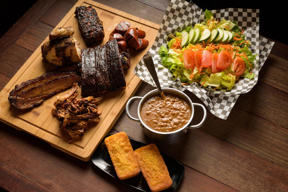 Guy Fieri declares the barbecue authentic at Fat Daddy's Smokehouse in Maui.