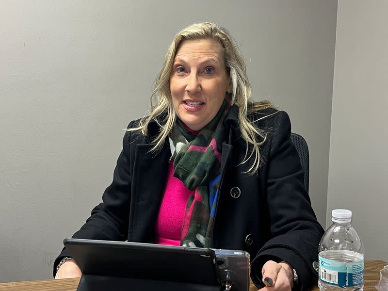 Kelly Sackett, chair of the Republican Party in Kalamazoo County, sits at the party's office in Portage, Michigan