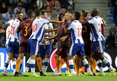 Football Soccer - FC Porto v AS Roma - UEFA Champions League Qualifying Play-Off First Leg - Dragao stadium, Porto, Portugal - 17/8/2016 FC Porto's players scuffle with AS Roma's players. REUTERS/Miguel Vidal