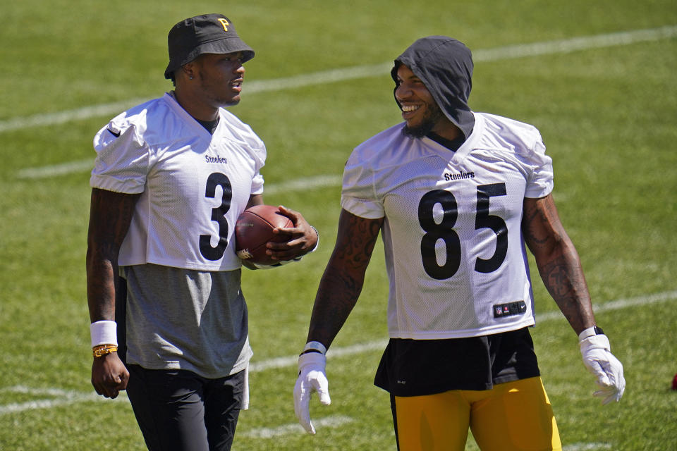 Pittsburgh Steelers quarterback Dwayne Haskins (3) and tight end Eric Ebron (85) work during the team's NFL minicamp football practice in Pittsburgh, Thursday, June 17, 2021. (AP Photo/Gene J. Puskar)