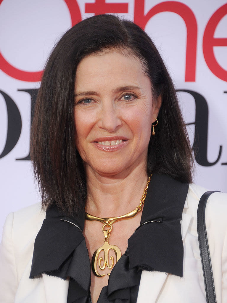 A closeup of Mimi Rogers smiling