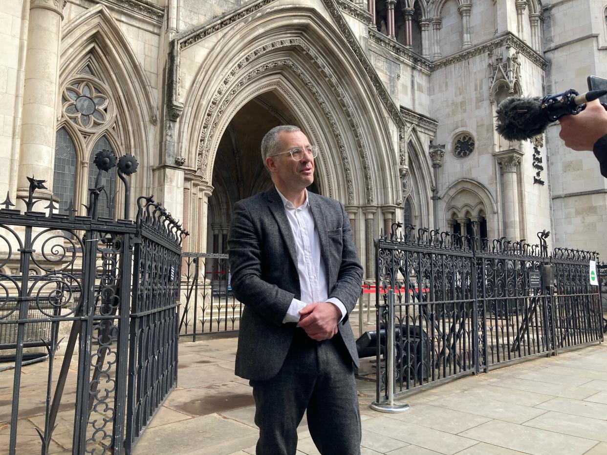 Tim Crosland speaks to media outside the Royal Courts of Justice, ahead of his hearing for contempt of court (PA)