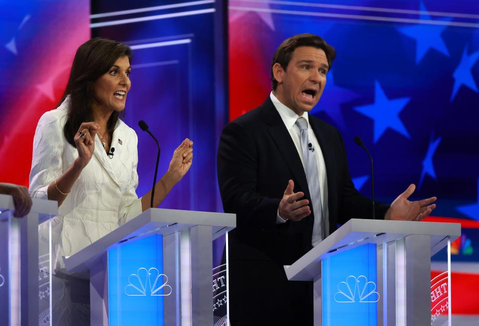 Republican presidential candidates former U.N. Ambassador Nikki Haley and Florida Gov. Ron DeSantis participate in the NBC News Republican Presidential Primary Debate at the Adrienne Arsht Center for the Performing Arts of Miami-Dade County on Nov. 8, 2023 in Miami. Five presidential hopefuls squared off in the third Republican primary debate as former President Donald Trump declined again to participate.