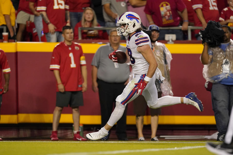 Buffalo Bills tight end Dawson Knox scores during the first half of an NFL football game against the Kansas City Chiefs Sunday, Oct. 10, 2021, in Kansas City, Mo. (AP Photo/Charlie Riedel)