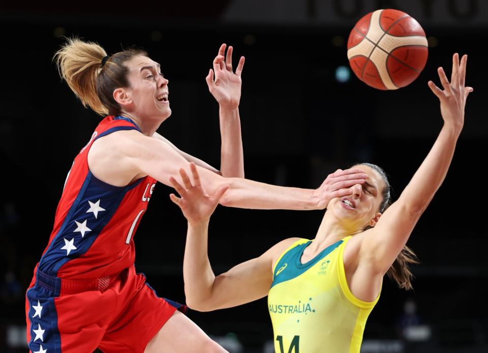 Breanna Stewart, left, of the U.S. and Australia's Marianna Tolo battle for a loose ball during Wednesday's game.