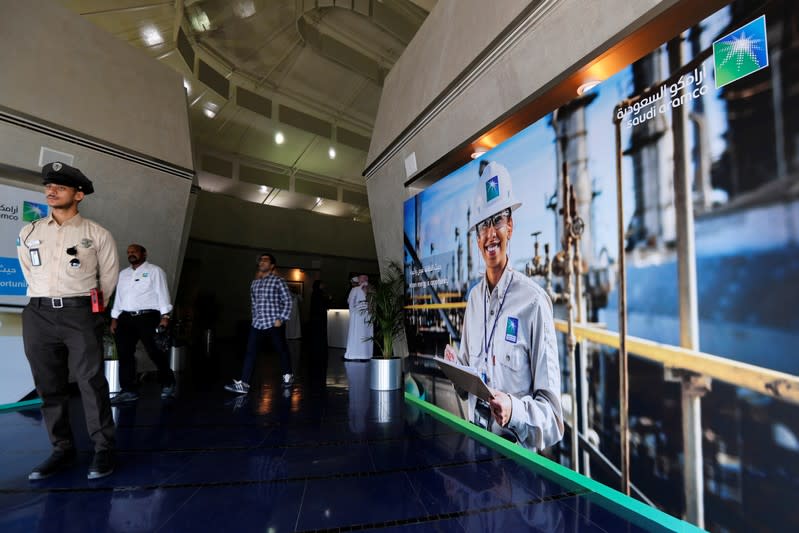 Security personnel stands before the start of a press conference by Aramco at the Plaza Conference Center in Dhahran