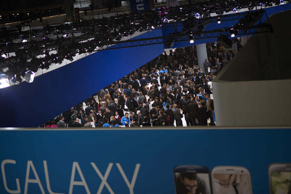 Visitors are seen in one of the pavilion of the Mobile World Congress.