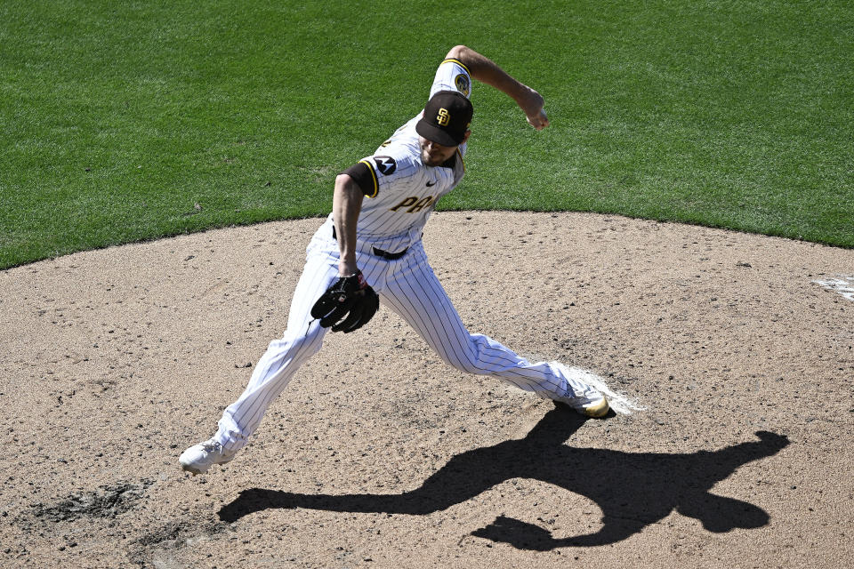 San Diego Padres relief pitcher Tom Cosgrove (59) delivers during the seventh inning of a baseball game against the St. Louis Cardinals, Wednesday, April 3, 2024, in San Diego. (AP Photo/Denis Poroy)