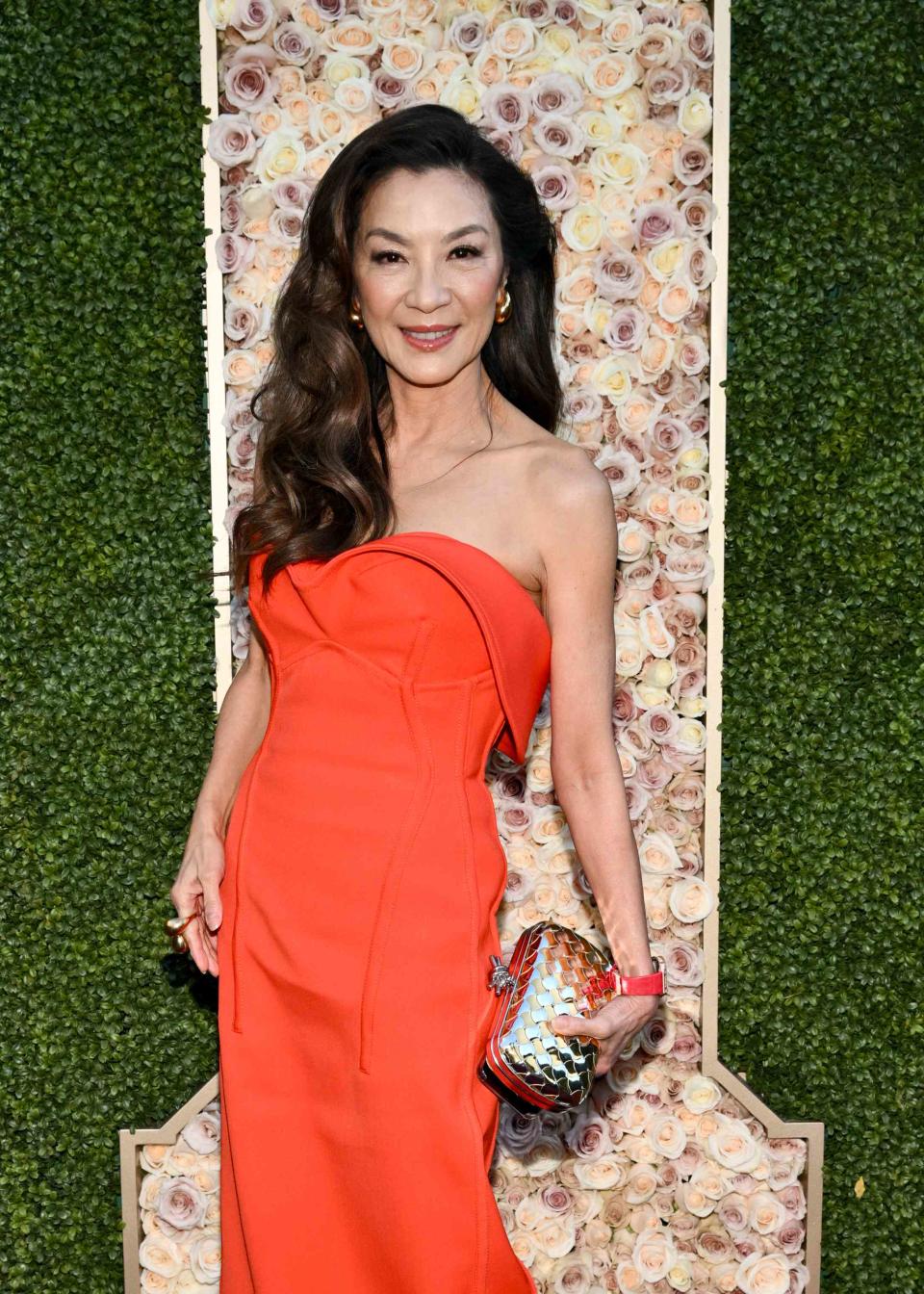 Michelle Yeoh Wore a Stunning Red-Orange Dress to the 2024 Golden Globes