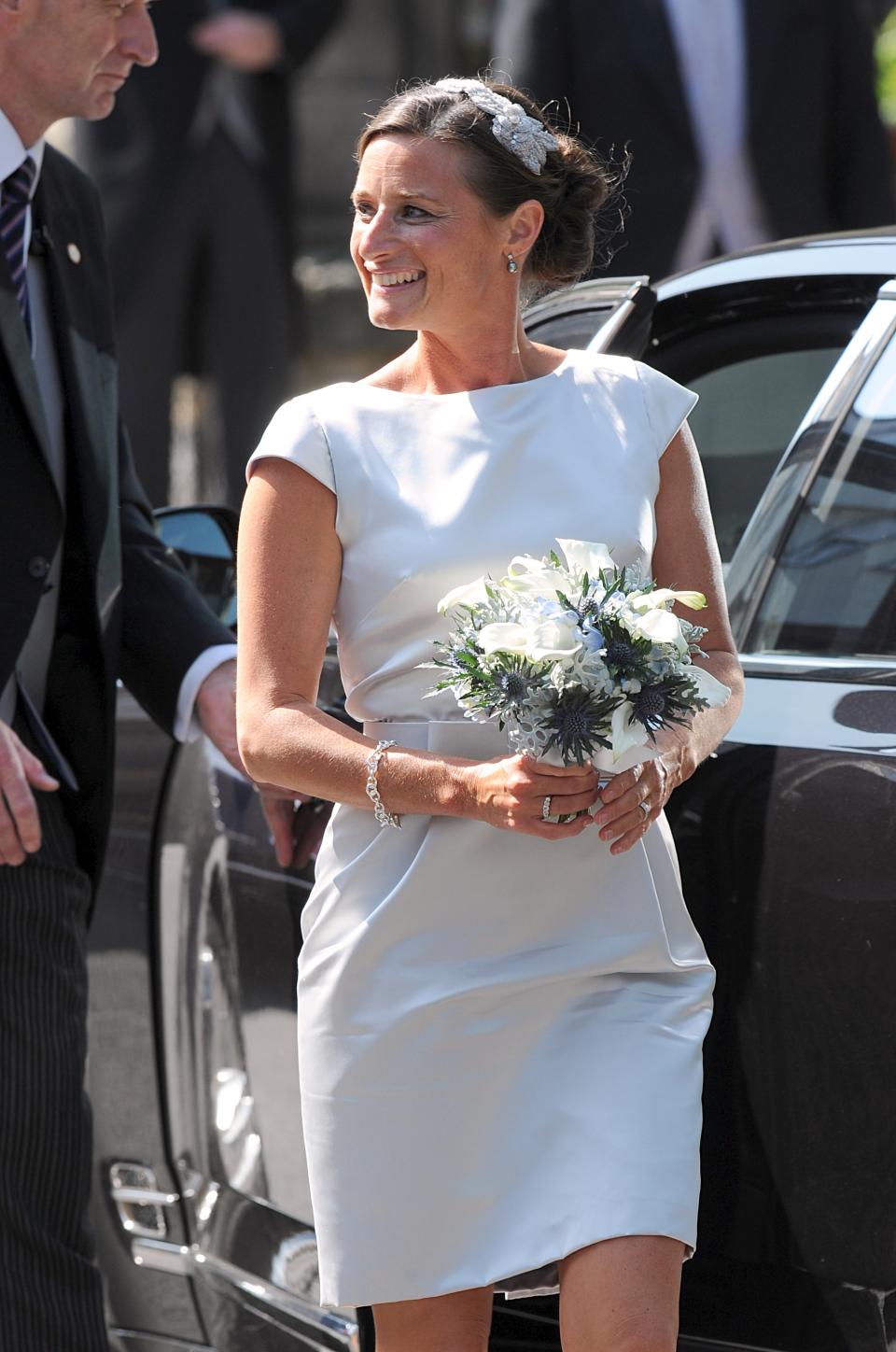 Maid of Honour Dolly Maude arriving for the wedding of Zara Phillips and Mike Tindall.   (Photo by Owen Humphreys/PA Images via Getty Images)