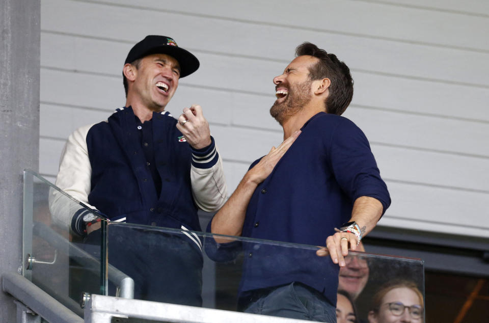 Wrexham co-owners Rob McElhenney (left) and Ryan Reynolds are moving up in the football world. (Action Images via Reuters/Ed Syke)