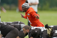 Cleveland Browns quarterback Deshaun Watson runs drills at the team's NFL football training camp, Saturday, July 22, 2023, in White Sulphur Springs, W.Va. (AP Photo/Chris Carlson)