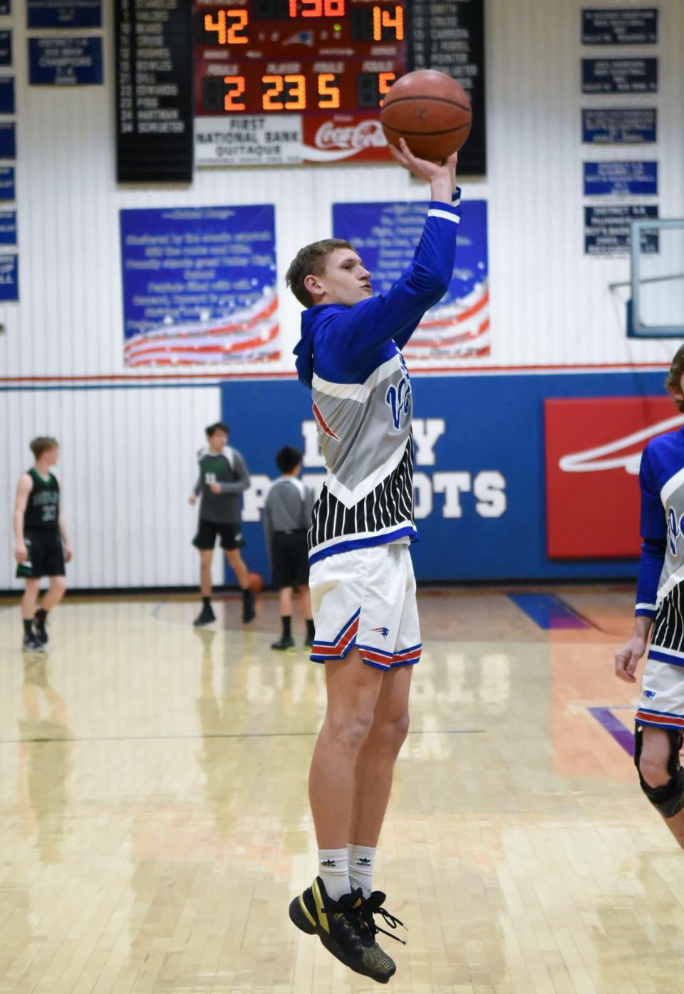 Valley's Parker Hartman (42) shoots a 3-point attempt in warmup before Valley's 46-34 win against Hedley on Friday, Jan. 28 2022 at Valley High School.