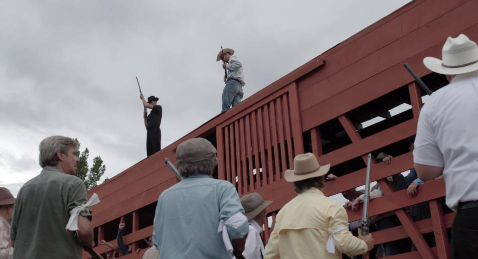 This undated photo provided by 4th Row Films shows striking miners being loaded in rail cars in "Bisbee '17," a story of how some 1,200 miners, most of them immigrants, were pulled violently from their homes in Bisbee, Ariz., by a private police force and put on cattle cars for deportation to a desolate area of New Mexico in 1917. The dark history of Bisbee was largely an open secret for decades in the funky old copper town just seven miles north of the U.S.-Mexico border. It's the sixth film of director Robert Greene, who said he learned about the town southeastern Arizona around 15 years ago. (Jarred Alterman/4th Row Films via AP)