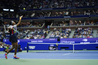 Coco Gauff, of the United States, serves to Caroline Garcia, of France, during the quarterfinals of the U.S. Open tennis championships, Tuesday, Sept. 6, 2022, in New York. (AP Photo/Frank Franklin II)