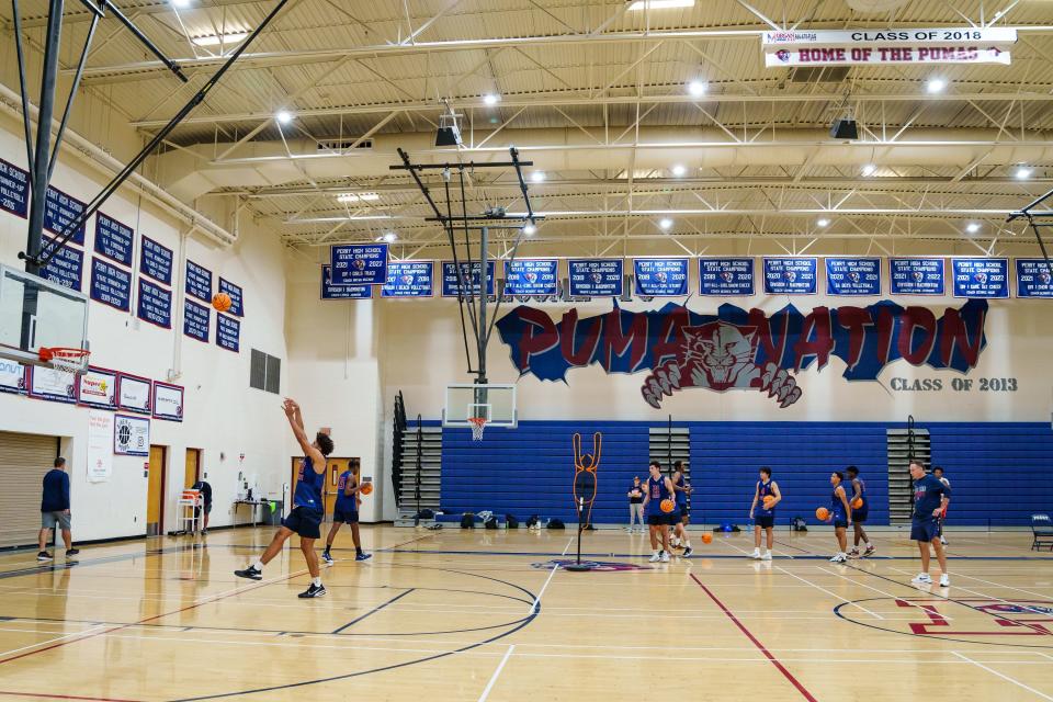 Perry's varsity boy's basketball team practices in the school's gym on Nov. 7, 2022, in Gilbert, Ariz.