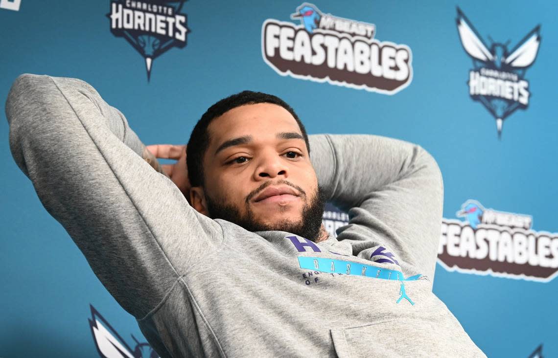 Charlotte Hornets Miles Bridges leans back an listens to a question during an interview with the local media at Spectrum Center on Monday, April 15, 2024.