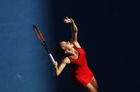 Tennis - Australian Open - Margaret Court Arena, Melbourne, Australia, January 22, 2018. Simona Halep of Romania serves against Naomi Osaka of Japan. REUTERS/David Gray