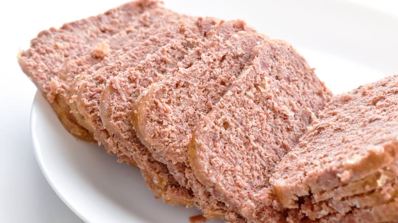 canned corned beef slices on white plate