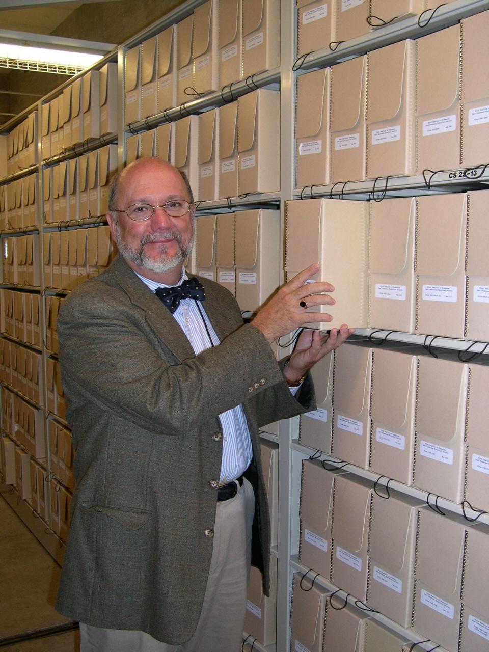 Steve Cotham looking through the archives of the McClung Historical Collection