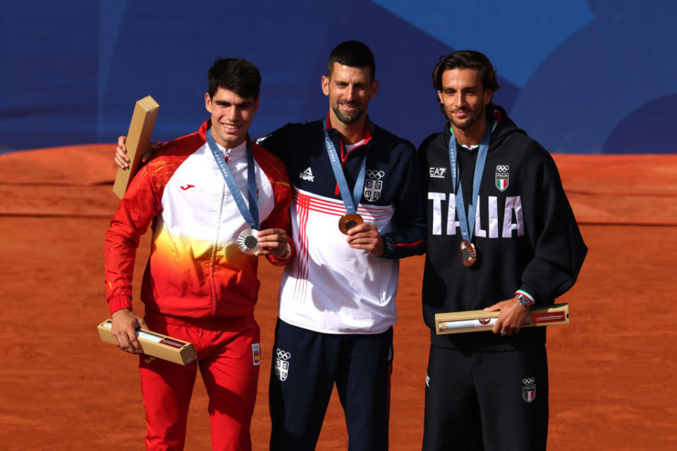 L to R: Carlos Alcaraz and Novak Djokovic at the men's singles tennis final at the 2024 Paris Olympics on Aug. 4.