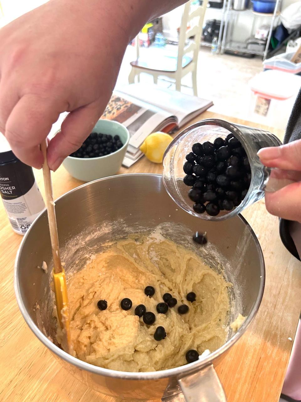 Adding blueberries to mixture for Ina Garten's Blueberry Ricotta Breakfast Cake
