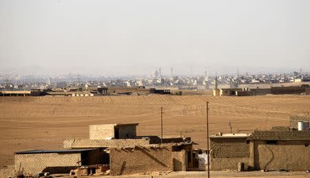 A view of Mosul city is seen during a battle with Islamic State militants, Iraq November 21, 2016. REUTERS/Thaier Al-Sudani