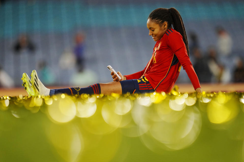 Spain's Salma Paralluelo sits on the pitch with her medal at the end of the Women's World Cup soccer final between Spain and England at Stadium Australia in Sydney, Australia, Sunday, Aug. 20, 2023. Spain won 1-0. (AP Photo/Abbie Parr)