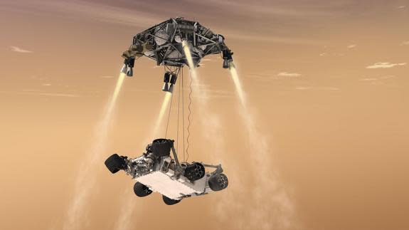 Sky Crane in aerial ballet mode during the descent of NASA’s Curiosity rover to the Martian surface.